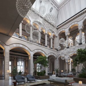 Luxe, modern ingerichte binnentuin met hoge bogen, glazen dak en opvallende bolvormige kroonluchters aan de Nieuwezijds Voorburgwal.